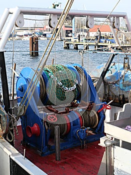 A winch for hauling in the trawl net on a fishing cutter