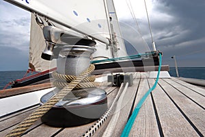 Winch with rope on sailing boat photo