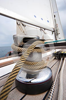 Winch with rope on sailing boat photo