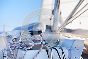 Winch with rope on sailing boat