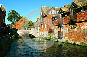 Winchester river Itchen bridge and old town, Hampshire, UK, on a