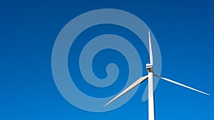 wind blade seen from behind on blue sky