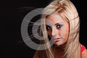 Wind blown Blond Young Woman