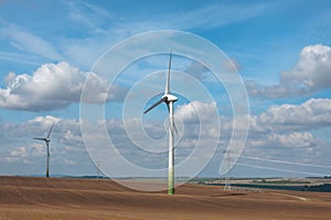 Wind electric generators on field.