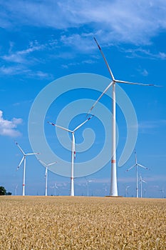 Wind energy plants in a grainfield