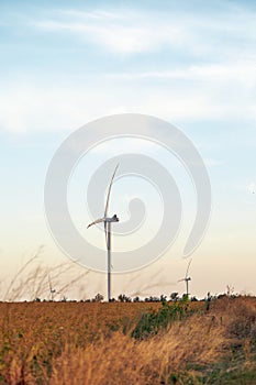 Wind energy. Wind power. Sustainable, renewable energy. Wind turbines generate electricity. Windmill farm on mountain