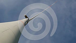 Wind energy.Wind Turbine close-up on sky background. Alternative natural sources of energy.Clean green bio energy