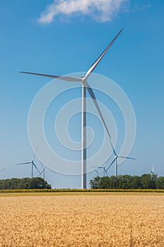 Wind farm Alternative Energy Pinwheels on blue sky