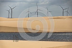 Wind farm - dunes and lake - Delta do ParnaÃÂ­ba, LenÃÂ§ois Maranhenses, PiauÃÂ­, Brazil. photo