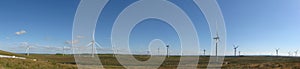 Wind farm panorama with blue sky