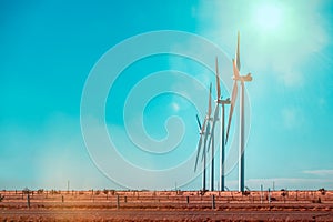 Wind farm in Texas, windmills in a row, copy space