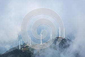 Wind farms in the misty clouds