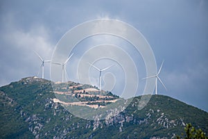 Wind genarators turbines on the pick of the mountain in Despotiko village at Ioannina perfecture greece