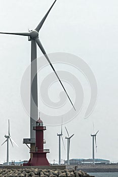 Wind generator on the cape next to the lighthouse