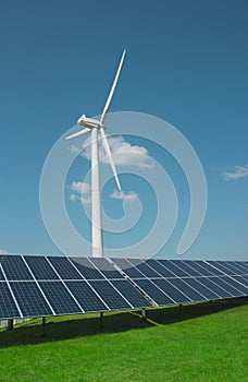 Wind generator of electricity from three blades and solar panels of a battery of photocells against