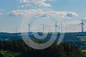 Wind generator silhouettes on the hills.Windmill set background.Green energy. renewable energy.Environmentally friendly