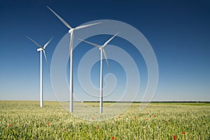 Wind generator turbine on spring landscape