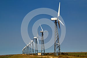 The wind generators against the blue sky photo