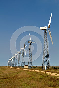 The wind generators against the blue sky photo