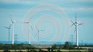 Wind generators and electric power pylons