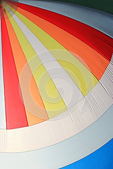 The wind has filled colorful spinnaker sail