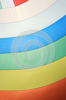 The wind has filled colorful spinnaker sail