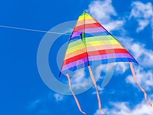 Wind kite flying in a blue sky