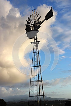 Wind mill on blue sky