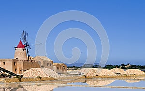 Wind Mill and covered heaps of salt