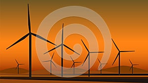 Wind mill farm silhouette in desert.
