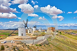 Wind mills and Consuegra Castle in Spain photo