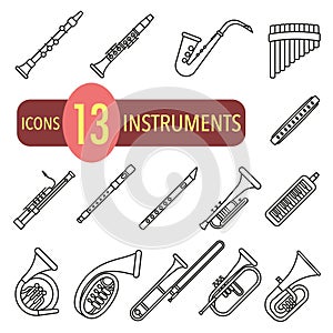 Wind musical instruments with the name in a thin line. Set of wind musical instruments