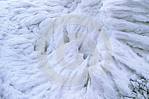 Wind painted Snow Texture Pattern on stone Background, Winter.