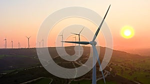 Wind power energy turbine industry farm aerial sunset