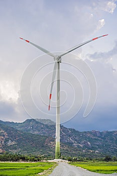 Wind power plant. green meadow with Wind turbines generating electricity