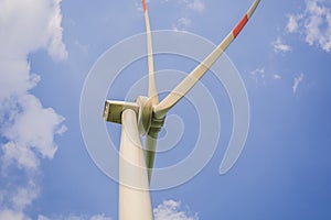 Wind power plant. green meadow with Wind turbines generating electricity