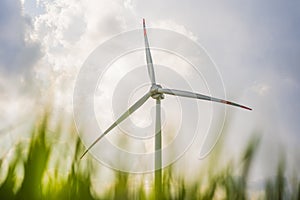 Wind power plant. green meadow with Wind turbines generating electricity