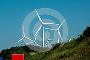 Wind power stations on a background of blue sky