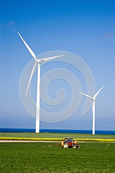 Wind power and tractor.