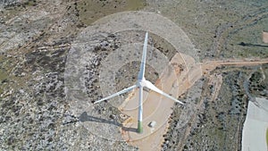 Wind power turbines under Velebit mountain view