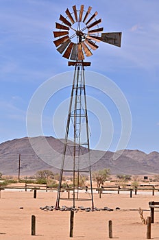 wind Pump in Namibia desert Africa Blue Sky Mountains Wind energy
