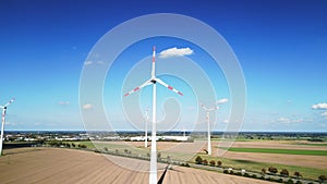 Wind renewable energy farm in brandenburg germany. Calm aerial view flight
