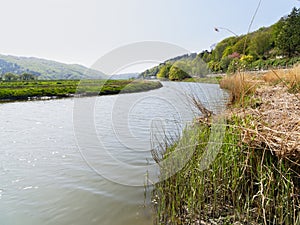 Wind rippled water of the River Dwyryd on a hazy spring day