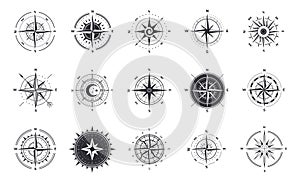 Wind rose. Compass signs. Nautical instruments for north orientation. Black and white contour cartographic symbols photo