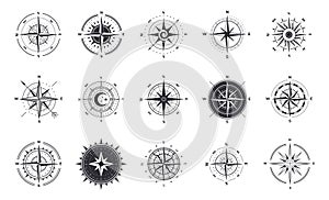 Wind rose. Compass signs. Nautical instruments for north orientation. Black and white contour cartographic symbols. Silhouettes of photo