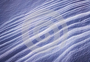Wind shaped snow abstract texture background