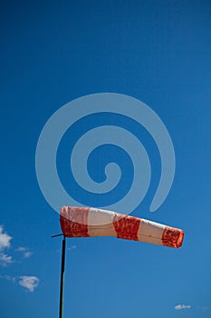 Wind sock against a blue sky