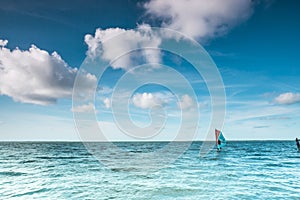 Wind surfer on a calm ocean at the North Sea