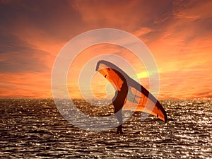 Wind surfer and sunset sky