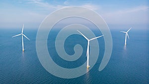 Wind turbine aerial view, Drone view at windpark westermeerdijk a windmill farm in the lake IJsselmeer